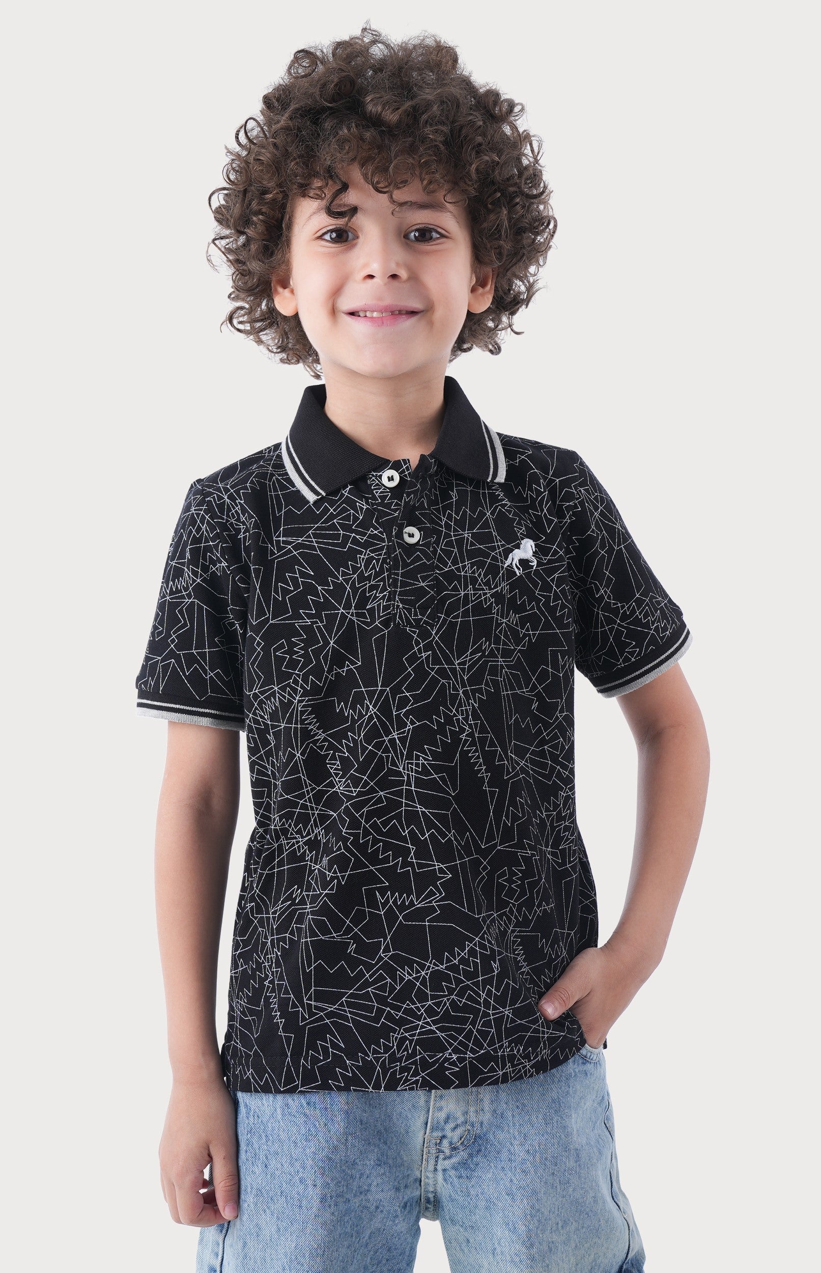 Polo Shirt With A Striking Geometric Pattern.